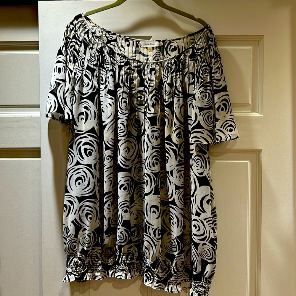 Calvin Klein black and white blouson blouse.